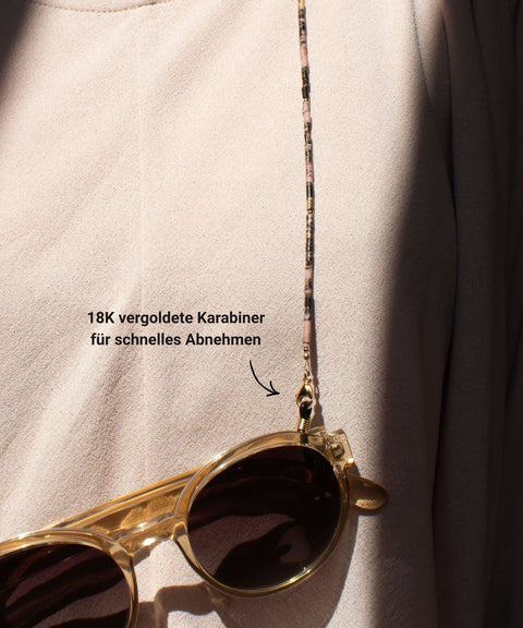 Glasses chain made of black rhodonite &amp; gold