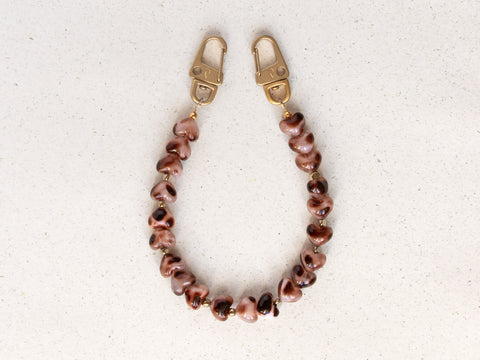 Short mobile phone chain “Leo” made of heart beads